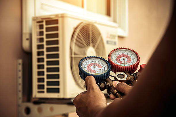 Professional Heat Pump Repair technician working in Ipswich, MA